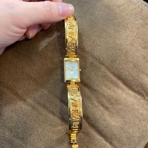 Yves Saint Laurent 40th anniversary bangle watch.